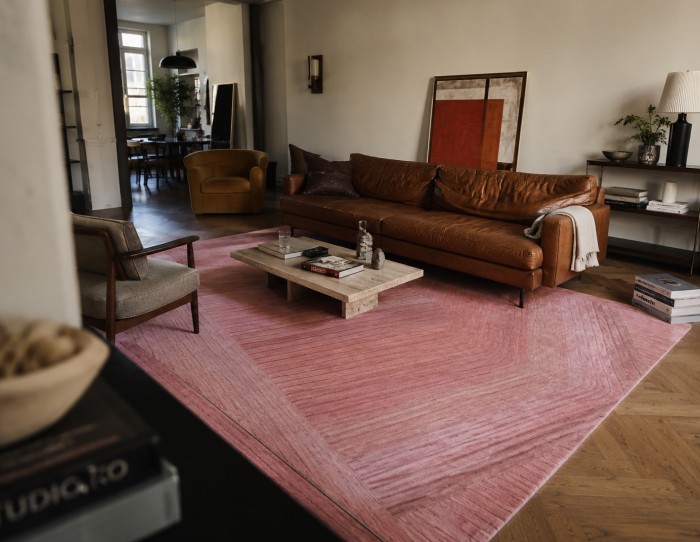 pink rug for brown leather sofa